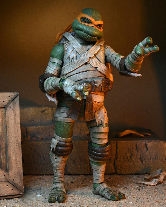 Buy Teenage Mutant Ninja Turtles X Universal Monsters – 7" Action Figurine – Ultimate Michelangelo as The Mummy - NECA Collectibles from Costume Super Centre AU
